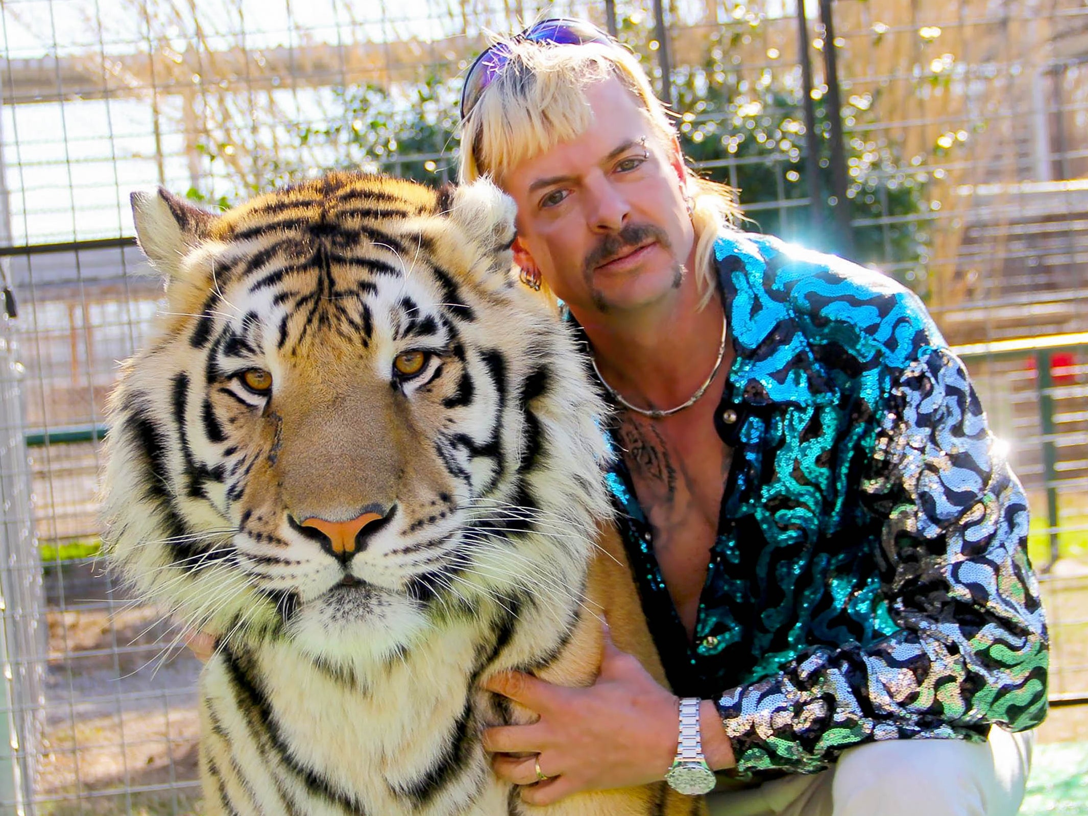 image of Joe Exotic from Tiger King with a tiger
